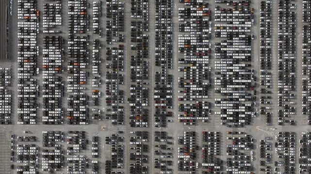 Aerial view new car lined up, Automobile automotive car parking lot commercial business industry, Port of import export business logistic dealership, New cars global business logistic import export.