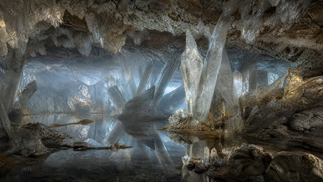 Crystal cave interior with glowing rock formations and reflective underground water.