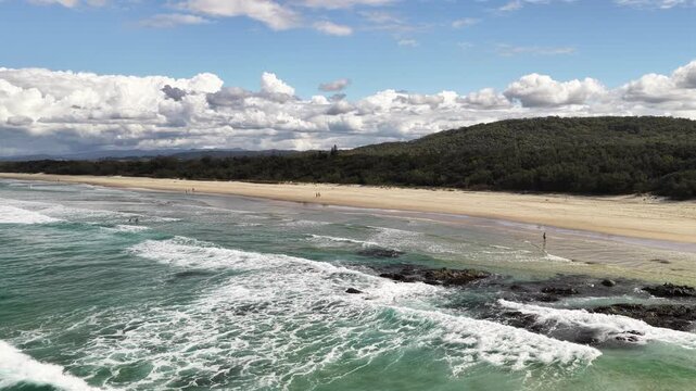 Hastings Point coastline from above, rocky point and golden sand, NSW Australia