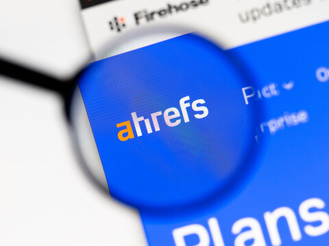 Milan, Italy 2026, 15 AGO Closeup of ahrefs website page on a laptop screen. Focus on ahrefs logo under a magnifying glass.
