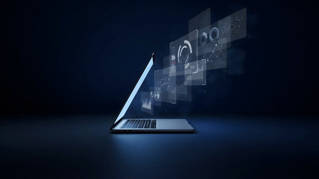Open laptop computer on a dark surface with glowing blue digital holographic interface screens displaying data charts and circular tech