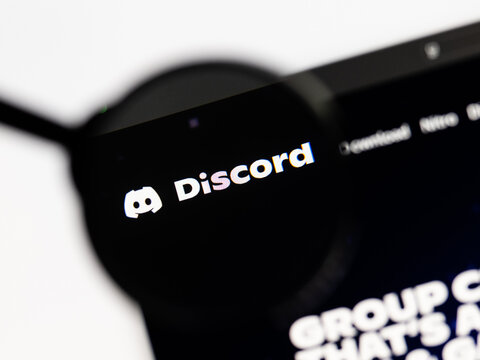 Milan, Italy 2026, 15 AGO Closeup of discord website page on a laptop screen. Focus on discord logo under a magnifying glass.