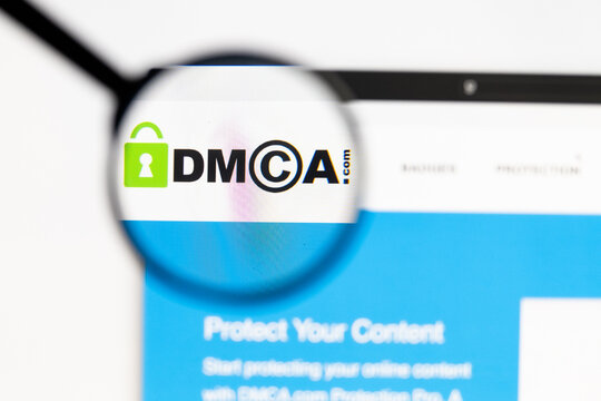 Milan, Italy 2026, 15 AGO Closeup of dmca website page on a laptop screen. Focus on dmca logo under a magnifying glass.