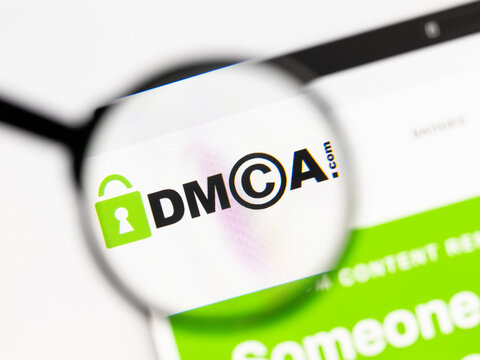 Milan, Italy 2026, 15 AGO Closeup of dmca website page on a laptop screen. Focus on dmca logo under a magnifying glass.