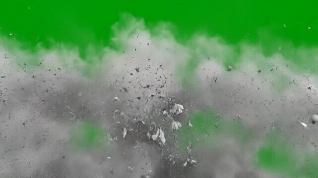 concrete debris and dust smoke explosion blast on green screen