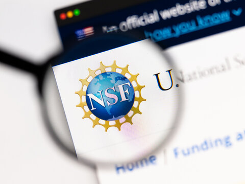 Milan, Italy 2026, 15 AGO Closeup of National Science Foundation NSF website page on a laptop screen. Focus on National Science Foundation NSF logo under a magnifying glass.