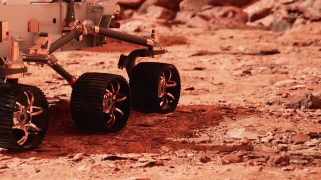 A Mars rover moves across the rocky terrain of Mars in search of samples. This exploration aims to collect data and understand the planets environment better.