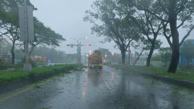 Municipal Truck Clearing Streets Of Tree Debris During Hurricane