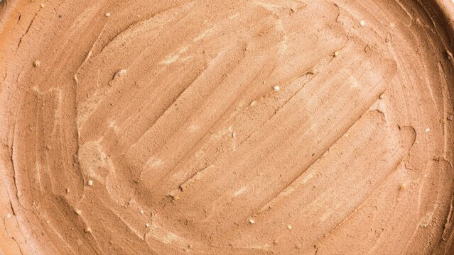 Brown chocolate mousse or cream spread with visible swirl texture