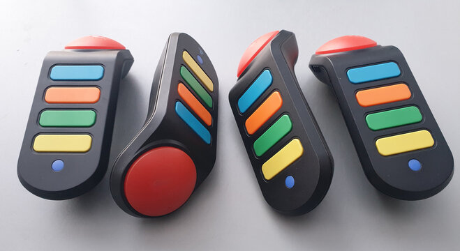 Four Colorful Game Show Quiz Video Game Controllers