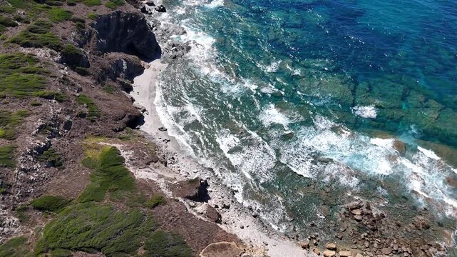 Aerial Drone View of Rena Majore Beach and Turquoise Mediterranean Waters, Sardinia
