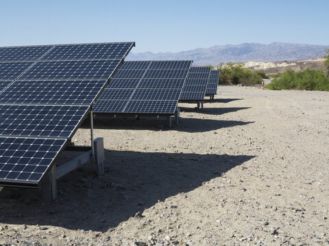 View of solar panels installed at the Furnace Creek Visitor Center in the desert landscape of Death Valley, California, United States.