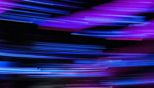 Abstract Blue and Purple Neon Light Trails in Fast Motion