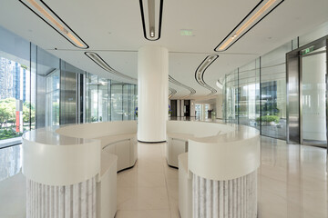 Obraz premium Modern office building lobby white curved reception desk