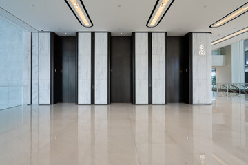 Obraz premium modern business office building elevator hall interior
