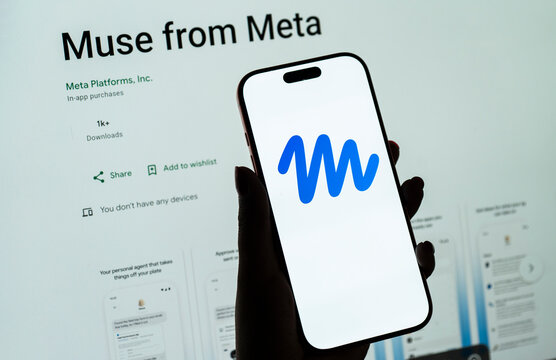 In this photo illustration, a person holds a smartphone displaying the logo of Muse, Meta&rsquo;s personal AI agent.