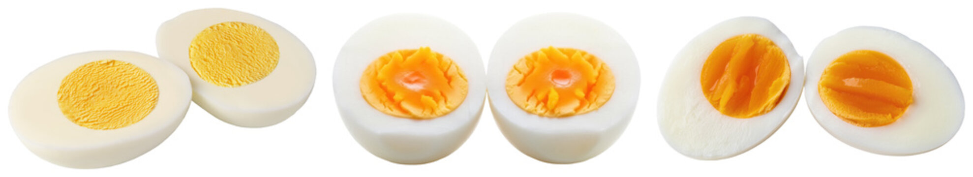 Several halves of hard-boiled eggs with yellow yolks and white shells, isolated on a transparent background.