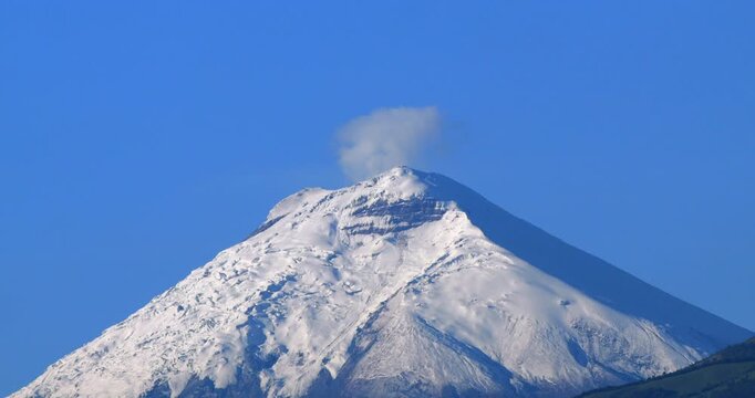Snowfields and glacier near the summit of Cotopaxi Volcano, Ecuador. Shot from 40kms away in Sangolqui, demonstrating the extreme clarity of the air at high altitudes