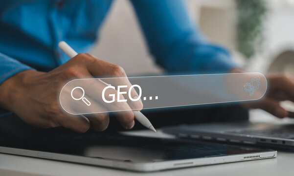 GEO Generative Engine Optimization, Close-up of businessman hand typing on laptop keyboard with search bar, Concept of AI SEO, digital marketing strategy and modern online search technology network