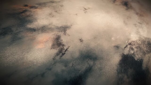 Abstract cloudy texture drifts through a moody atmospheric field. Cinematic title sequences, dramatic transitions, and documentary atmosphere.
