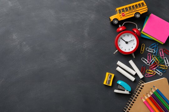 Back to School Stationery and Yellow Bus Model Side Border Frame on Blackboard