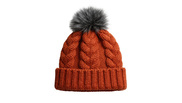 Orange knitted beanie with cable knit pattern and grey pompom, isolated on transparent background