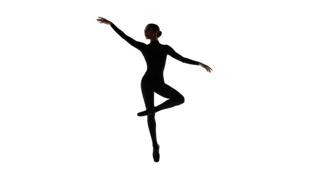 Graceful ballerina in black leotard performing arabesque, isolated on transparent background