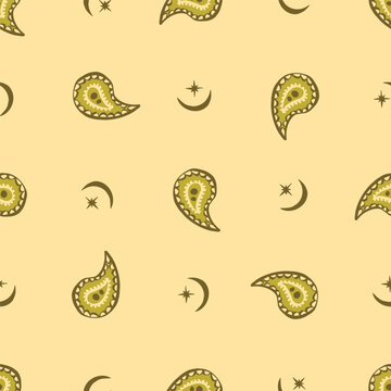 Seamless celestial paisley pattern with golden paisley teardrops, crescent moons and stars scattered across warm pale yellow background