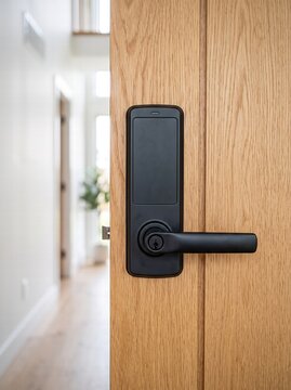 Modern Black Electronic Smart Lock On Light Wood Interior Door