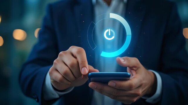 Businessman interacting with a holographic power button on a mobile device. Digital start up interface for business management system and innovative technology.