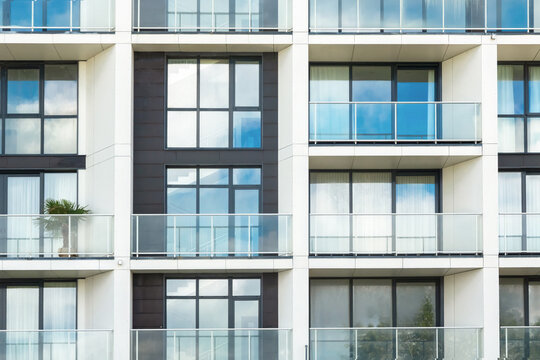 Modern apartment building facade pattern with balconies