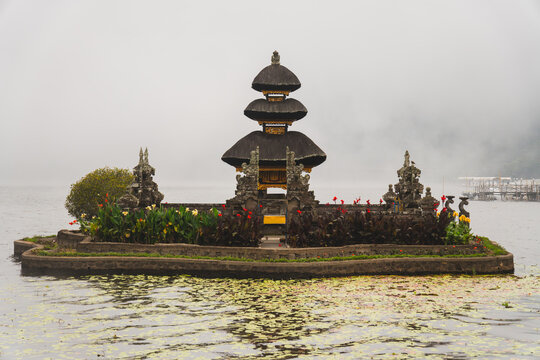 Three-Tiered Meru Tower of Pura Ulun Danu Beratan Floating on Misty Lake Beratan in Bali Indonesia