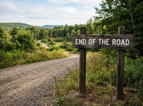 Wooden Sign Declares End Of The Road In Scenic Rural Landscape