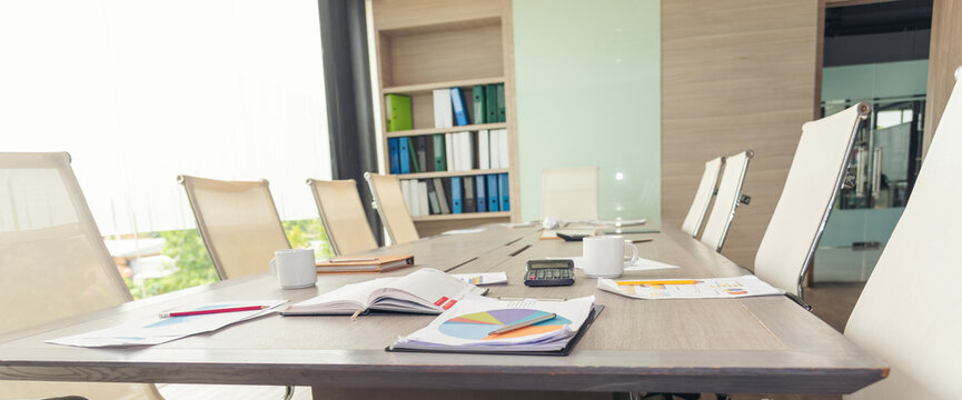 Blurry abstract background of conference room. Background office Business stuff mockup with copy space. Blur background office modern lobby urban decor empty on hallway office desk