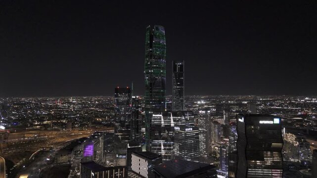 Cinematic Slow Aerial Push Toward KAFD Skyline at Night in Riyadh
