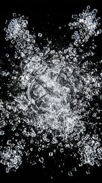 Shattered glass breaking into pieces on black background