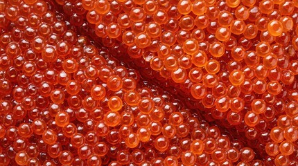 Obraz premium Macro close up of red caviar. Seafood delicacy and luxury appetizer concept for food blog and restaurant menu.
