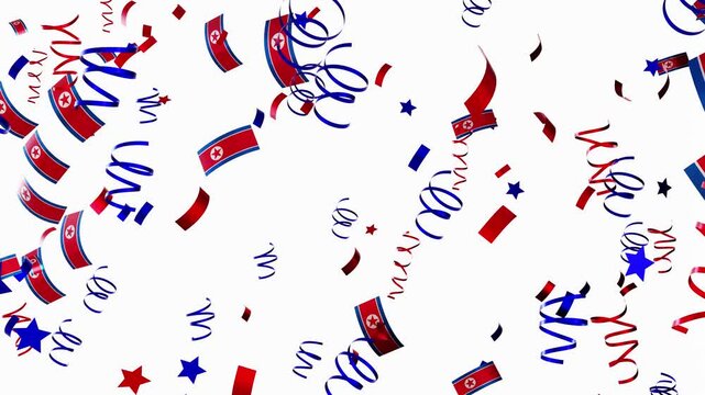 Falling confetti features North Korean flags and ribbons over a plain background. This moment captures the excitement of a celebration, filled with vibrant colors and joy