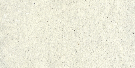 Fototapeta premium Warm Ivory Recycled Paper Texture with Fine Dark Flecks and Fibrous Grain