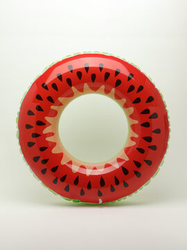 Inflatable watermelon pattern pool float ring isolated on white background