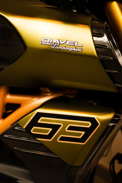 Krakow, Polska - September 06, 2026: Lamborghini Diavel 1260 motorcycle close-up showcasing the green metallic finish and distinctive 63 emblem on the side panel