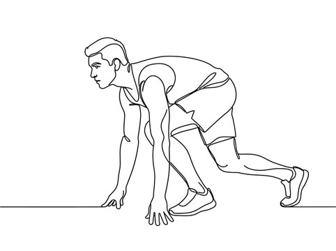 Athlete In Starting Position Ready To Race On Track