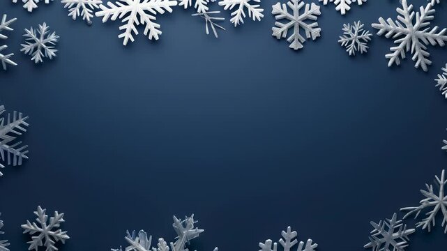 Delicate, shimmering snowflakes are arranged around the perimeter of the frame, creating a wintery border, set against a calm, dark blue background. Suggesting a serene winter or festive scene.