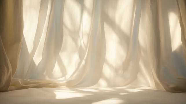 Soft cream fabric backdrop gently draped, illuminated by warm sunlight, revealing intricate window frame shadows