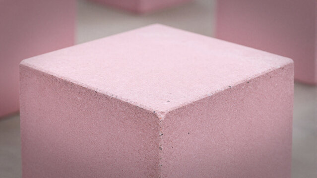 Minimalist pink concrete block pedestal
