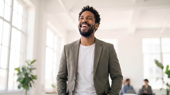 Happy black business leader smiling in modern office space, representing success, executive leadership, professional corporate growth, workplace optimism, and modern management solutions.