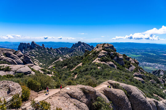 Panorama view of round rocky mountains of Sant Jeroni in Montserrat Nature Park near Barcelona in spring, Catalonia, Spain