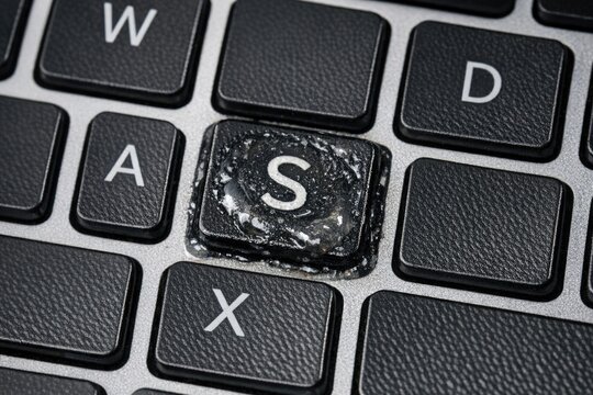A close-up shot of a computer keyboard with the letter S highlighted