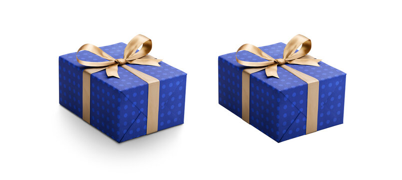 Two blue gift wrapped presents with blue patterned spots and gold ribbon bows, one with a shadow, one without isolated against a transparent background.