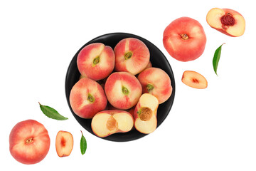 chinese flat donut peaches in ceramic bowl isolated on white background. Top view. Flat lay © kolesnikovserg